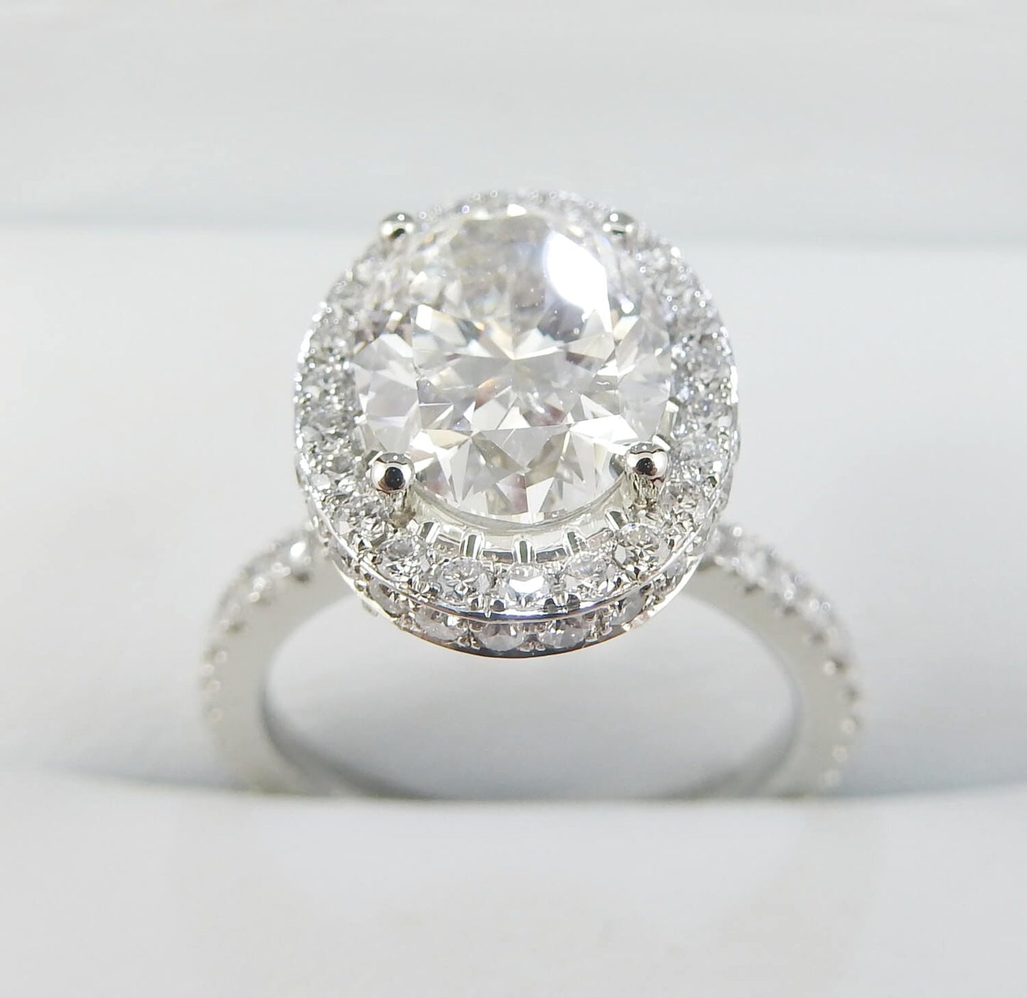 19K White Gold 2.10ct Oval Diamond Halo Engagement Ring