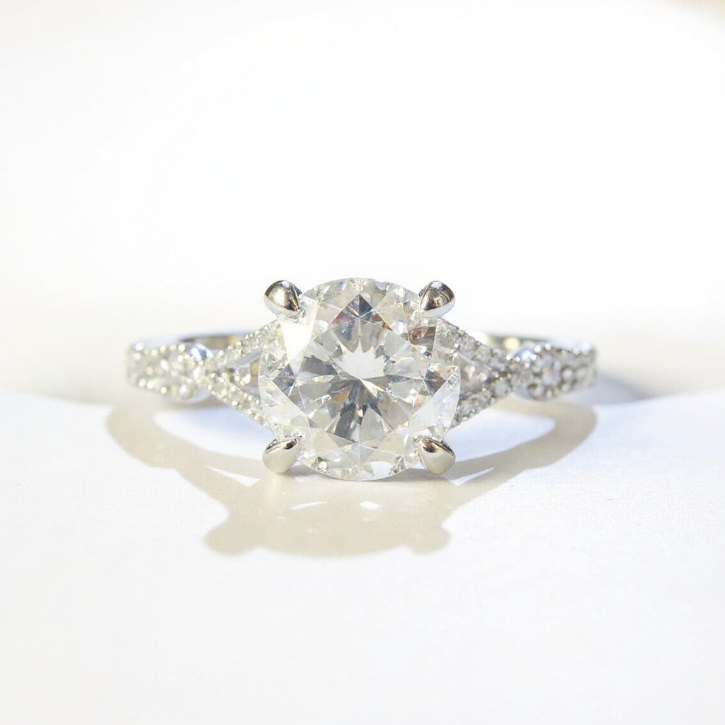 19K White Gold 1.80 CTW Round Brilliant Twisted Pavé Engagement Ring