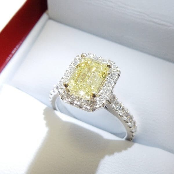 Fancy light yellow emerald diamond halo