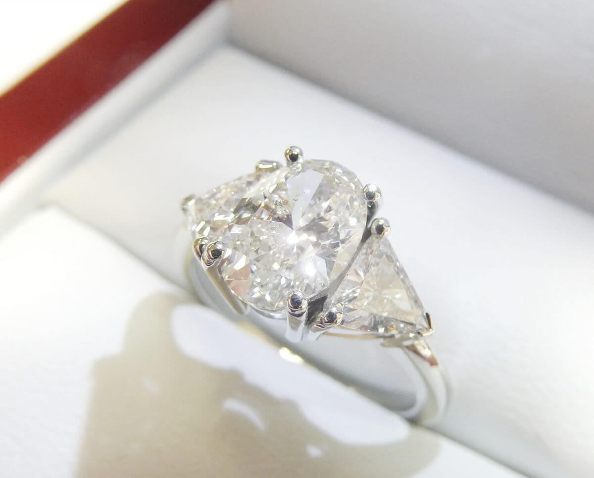 Diamond trillion engagement ring platinum