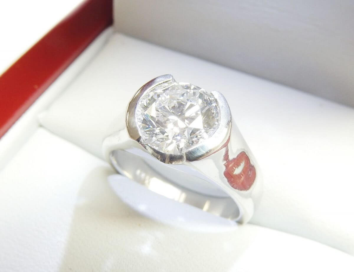Platinum solitaire bezel diamond engagement ring gla