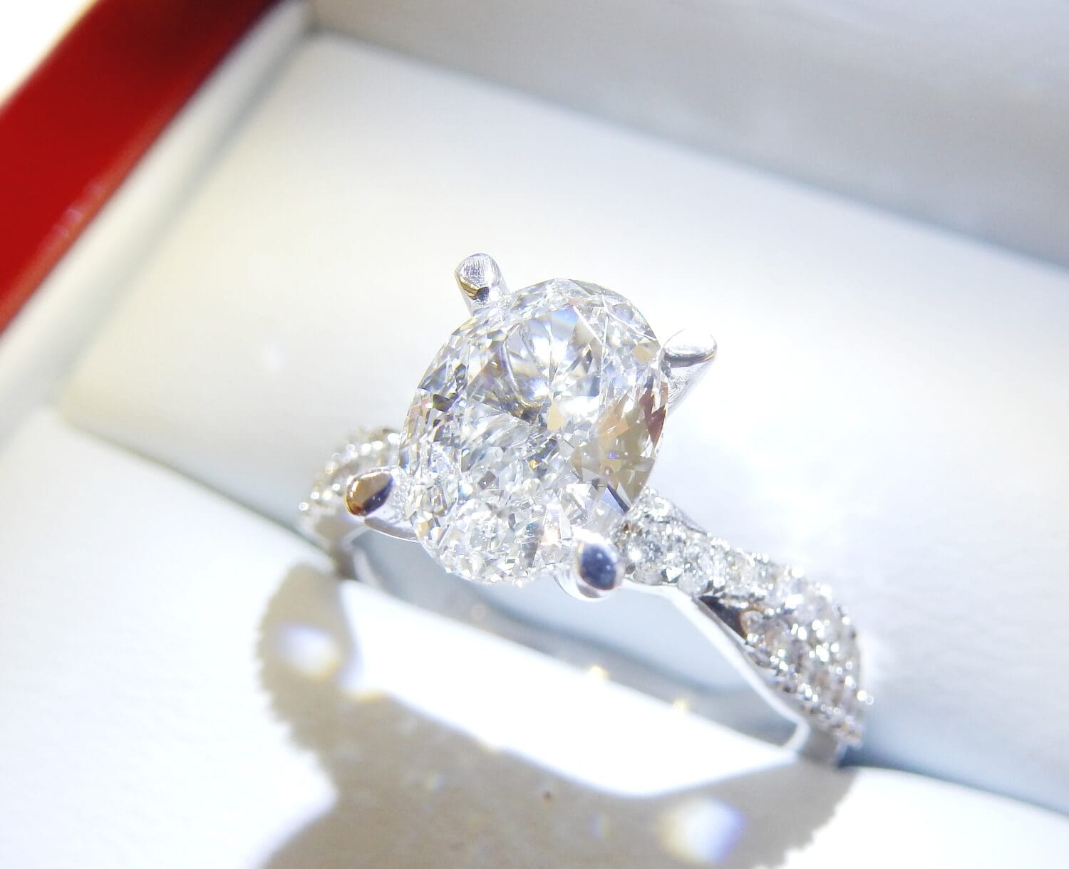 Twisted Micro Pave Solitaire with Oval Diamond DiamondNet