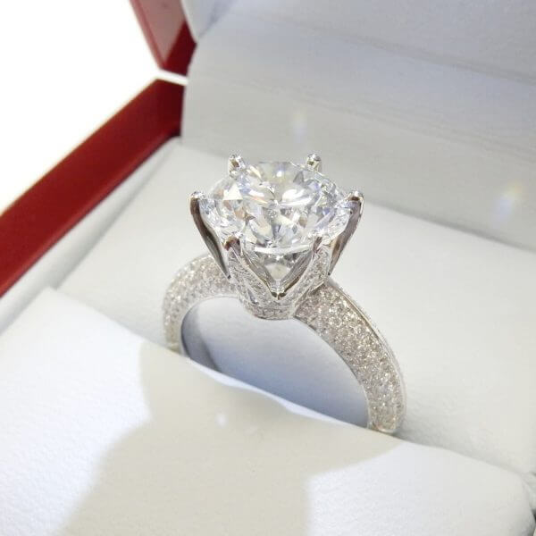 lced diamond siz prong solitaire engagament ring