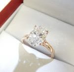 Oval diamond rose gold solitaire