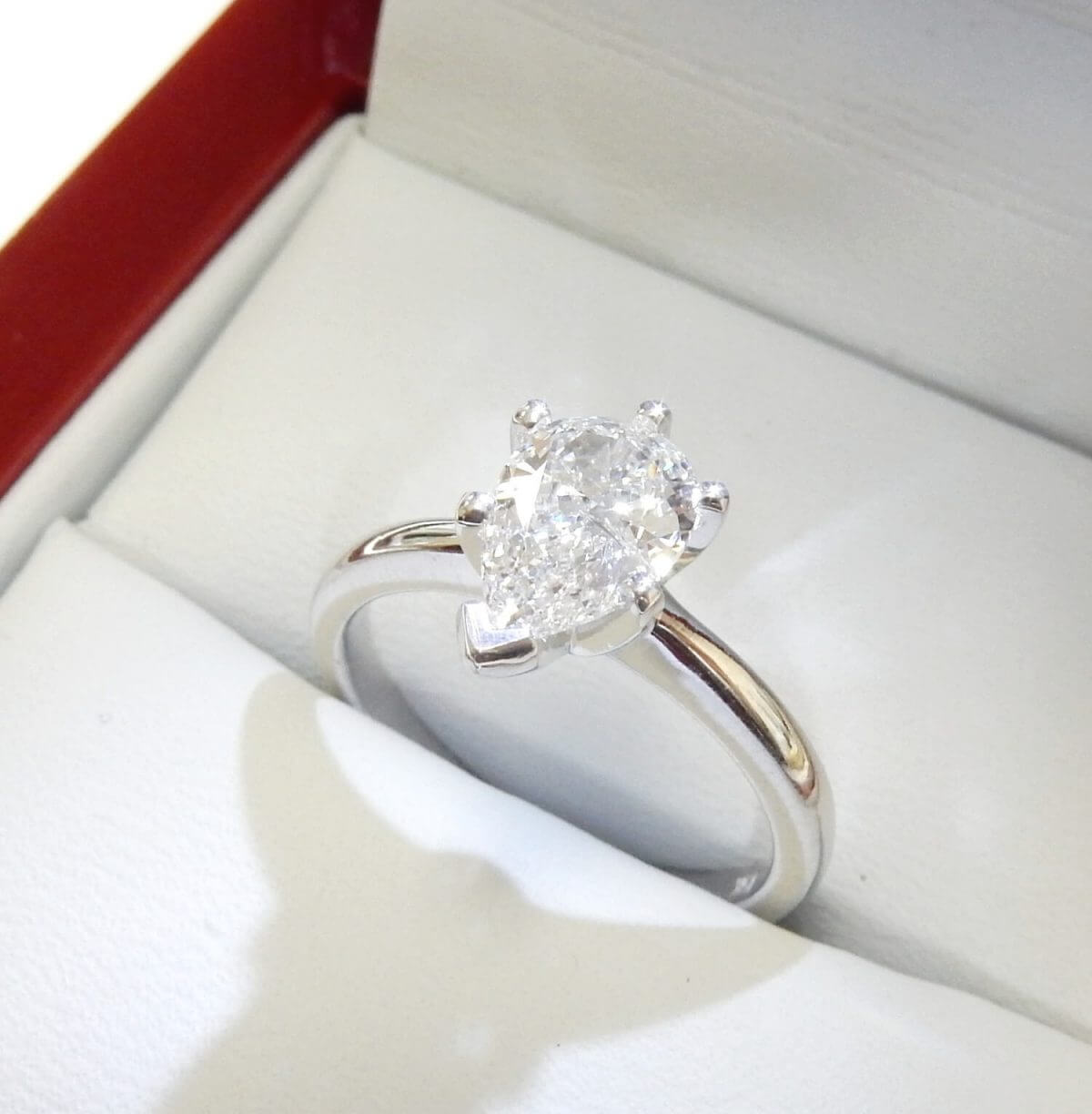 Pear shape diamond solitaire engagement ring