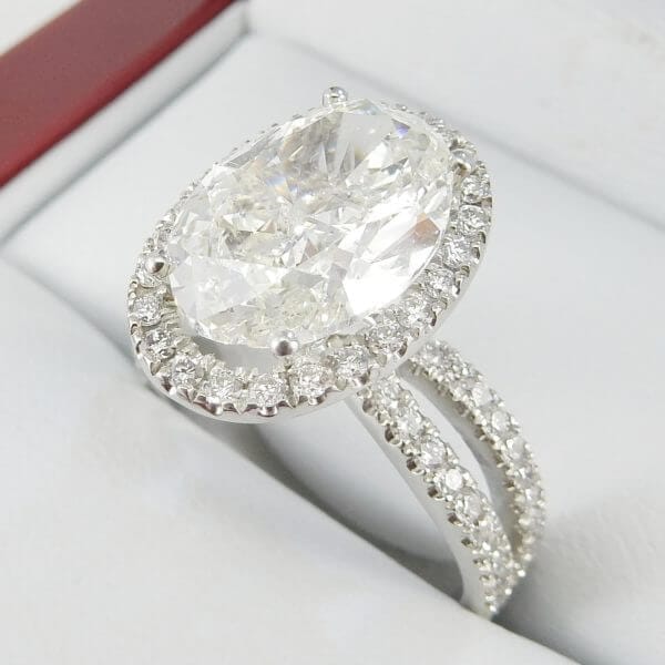 4.26ct-Oval-Diamond-Cross-Shank-Halo-Ring-DiamondNet.ca (2)