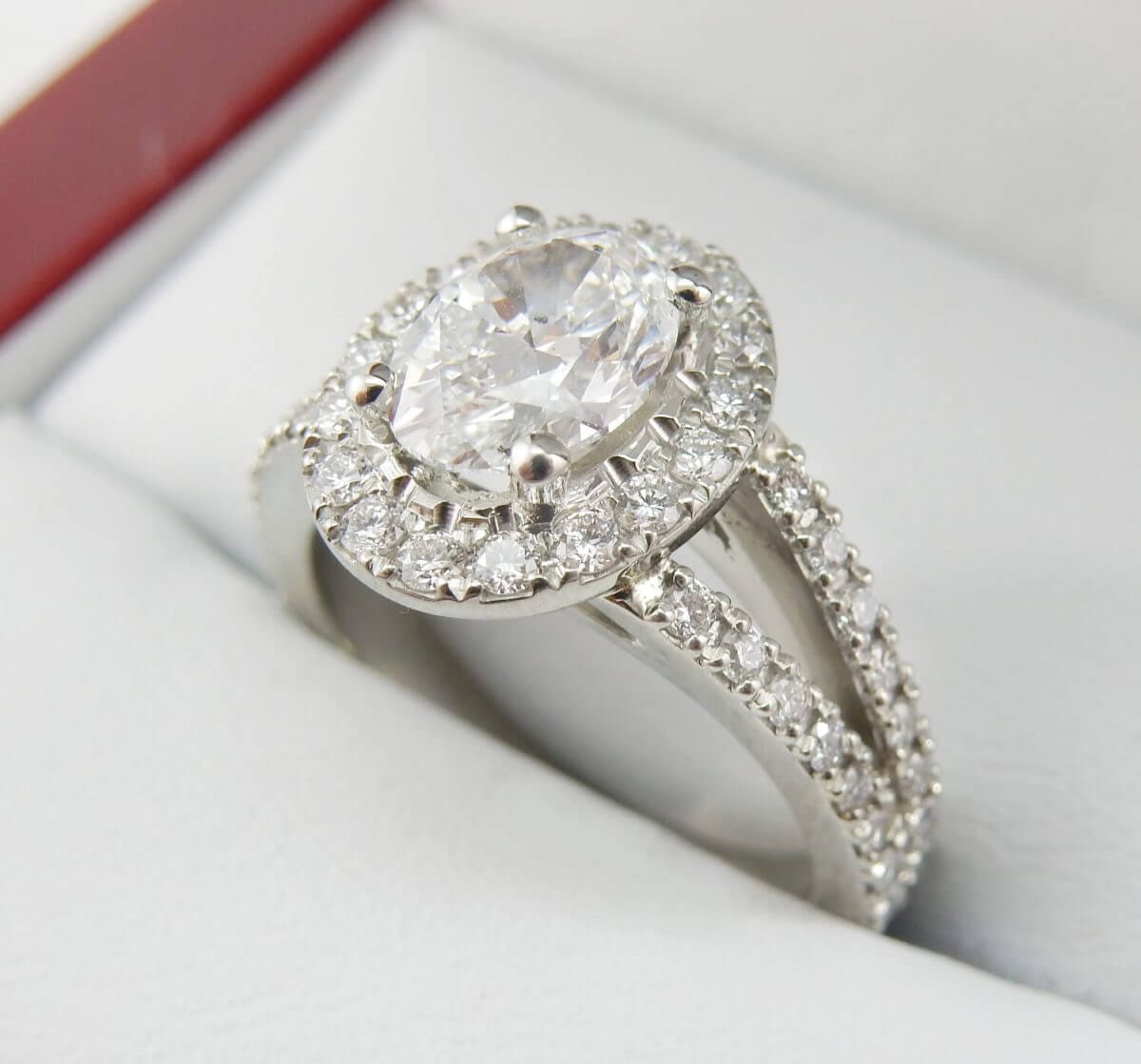 Split-Shank-Oval-Diamond-Halo-Engagement-Ring-DiamondNet.ca