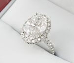 Oval-Diamond-GIA-Halo-Engagement-Ring-DiamondNet.ca