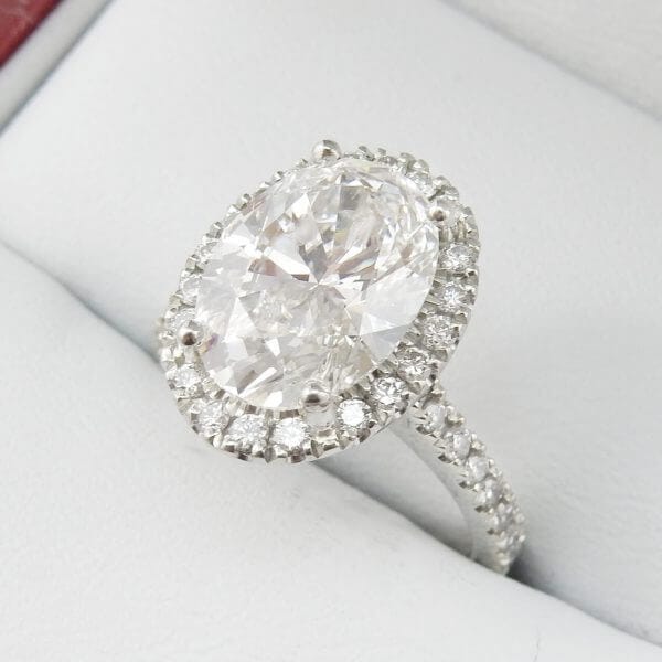 Oval-Diamond-GIA-Halo-Engagement-Ring-DiamondNet.ca