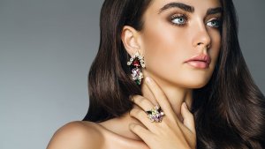 Elegant girl advertising jewelry