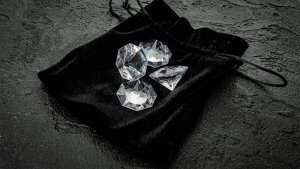 Diamond on the black beautiful shining crystal