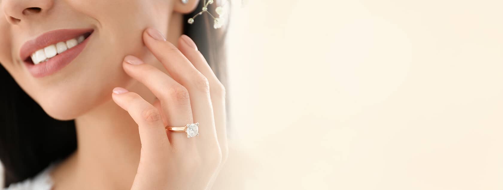 Smiling woman showing her diamond ring