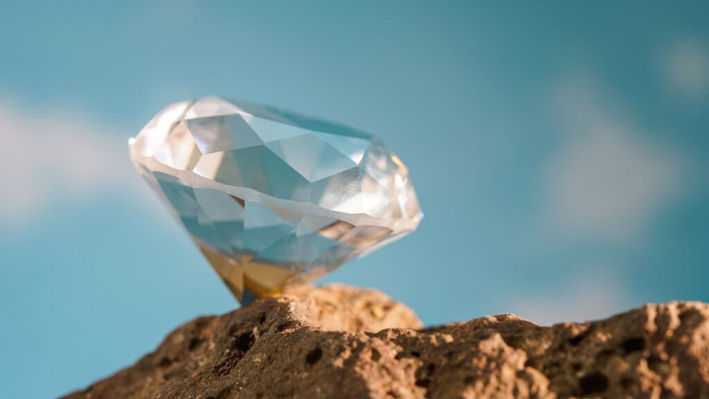 Natural sapphire gemstone on a rock