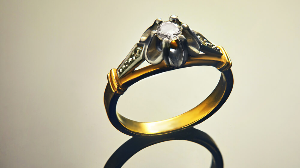 old white and yellow gold ring with diamonds