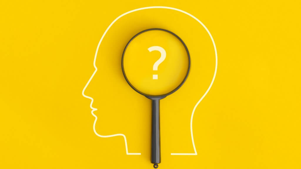Human head with a question mark on yellow background