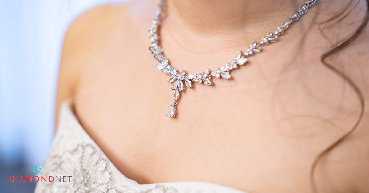 A radiant bride in a white gown, complemented by exquisite jewelry, highlighting various wedding necklace styles