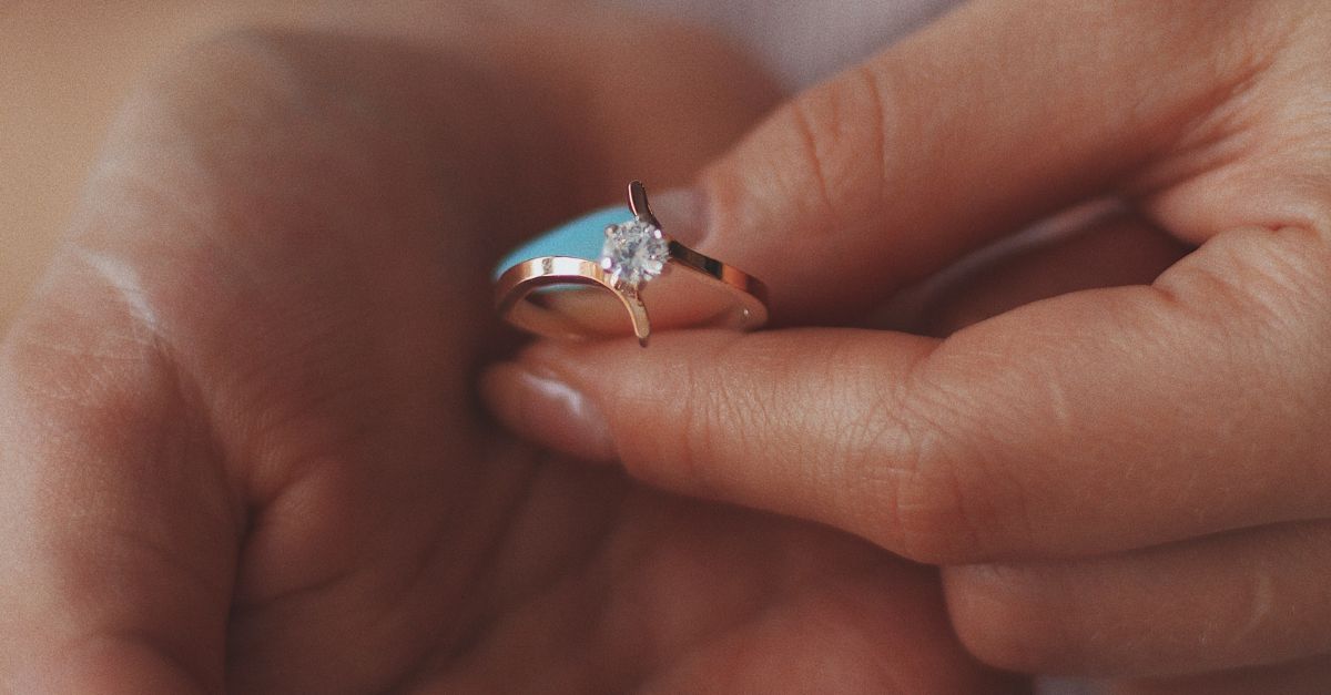 Ring with asymmetrical wrap-around design